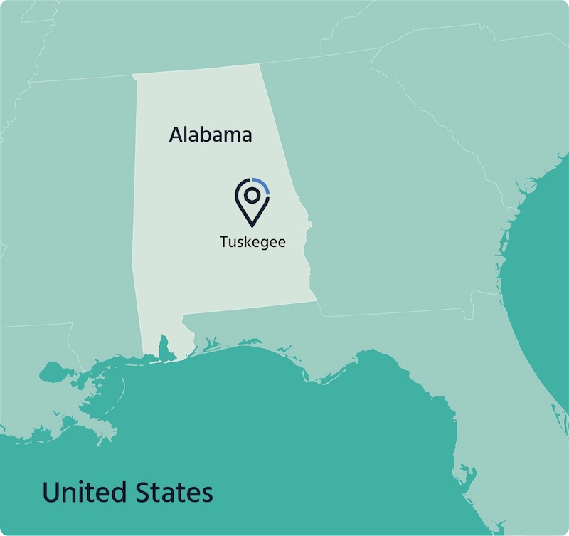 A map of US highlighting Alabama state with Tuskegee mark on it